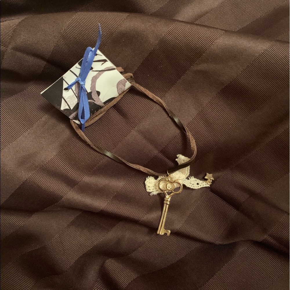Suede strap key necklace